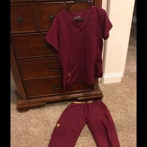 Wink four-stretch maroon colored scrubs